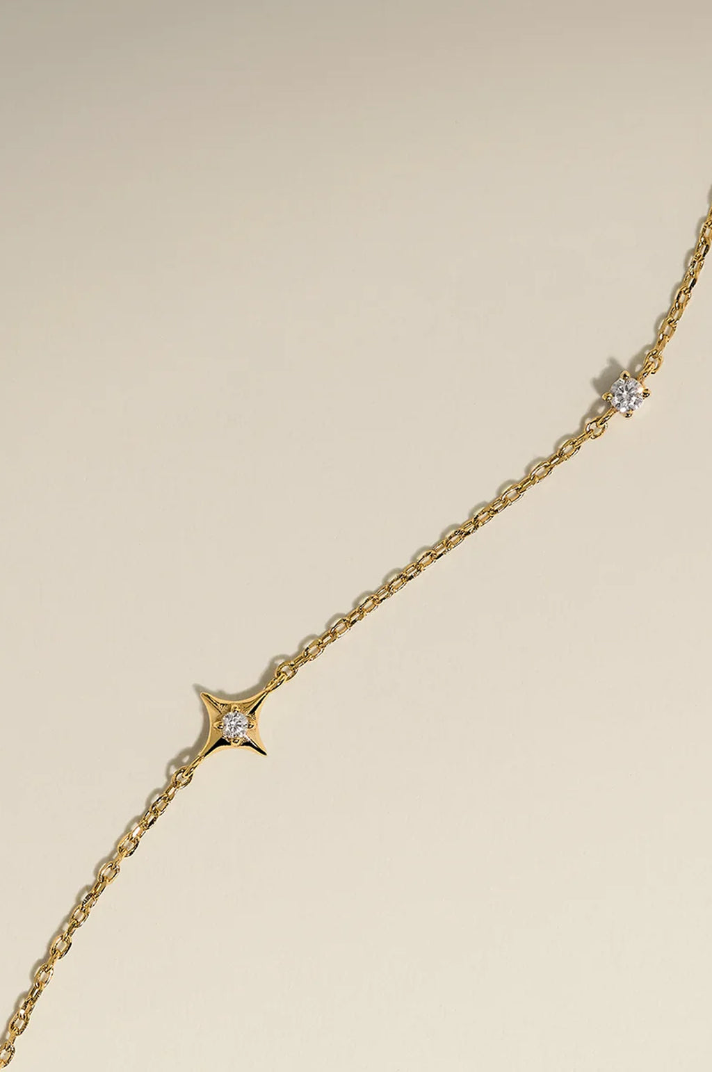 Cosmic Star Charm Bracelet in Gold