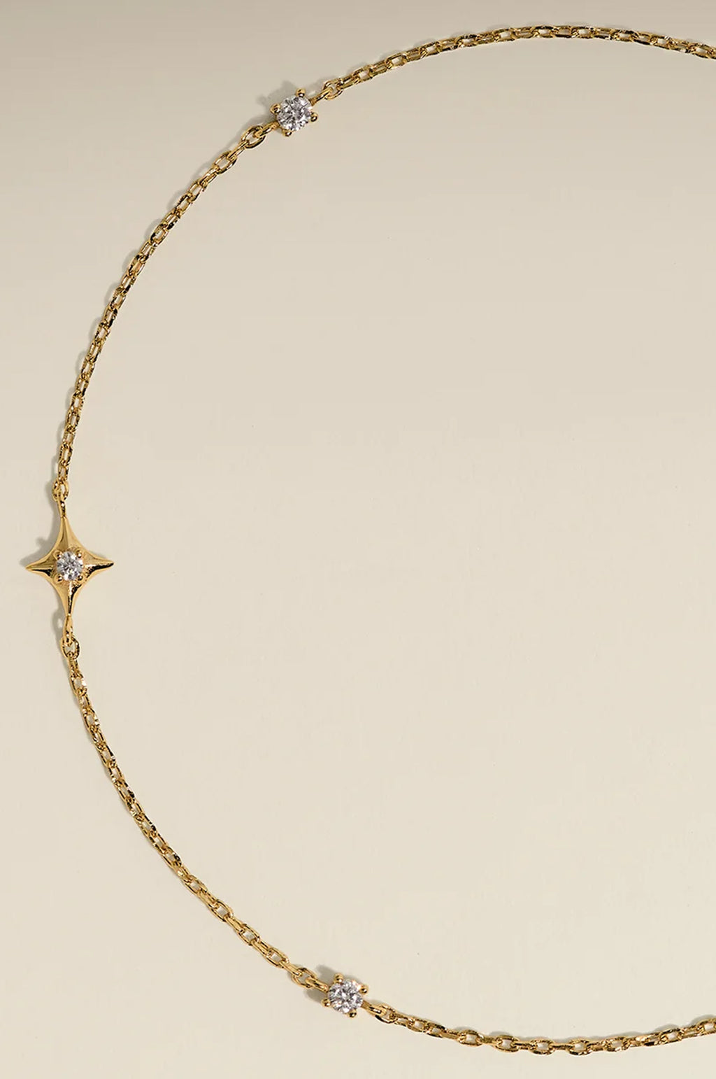 Cosmic Star Charm Bracelet in Gold