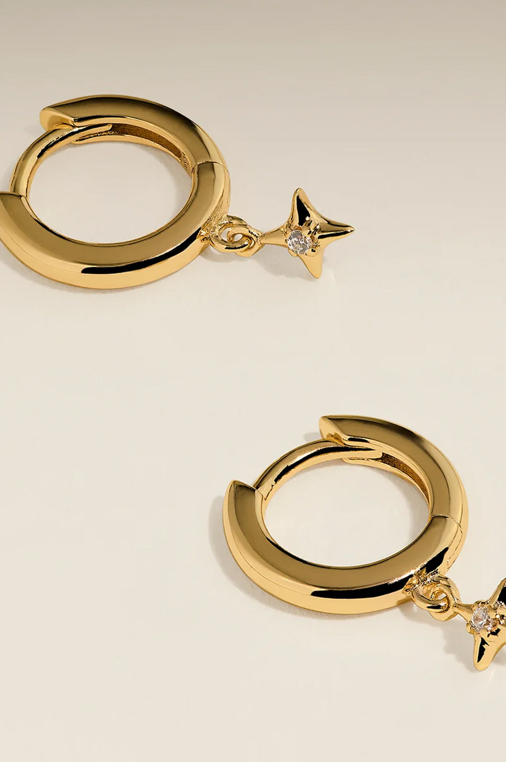 Cosmic Star Charm Huggies in Gold