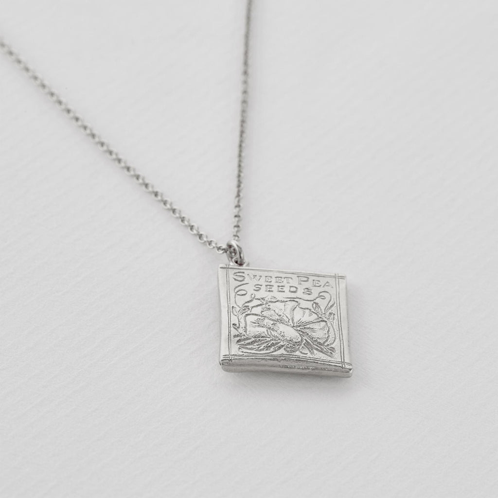 A.M. Sweetpea Seed Packet Necklace Silver