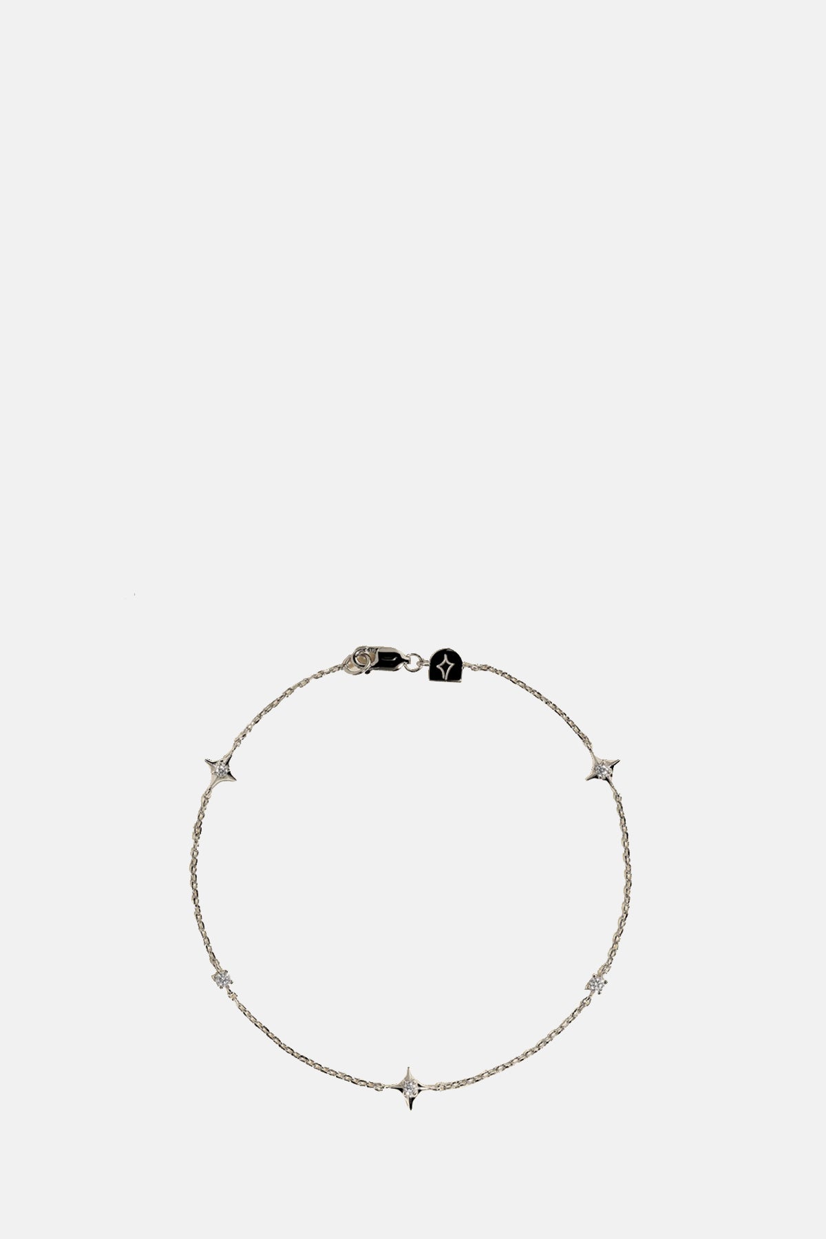 Astrid & Miyu Cosmic Star Charm Bracelet in Silver.