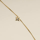 Cosmic Star Charm Necklace in Gold