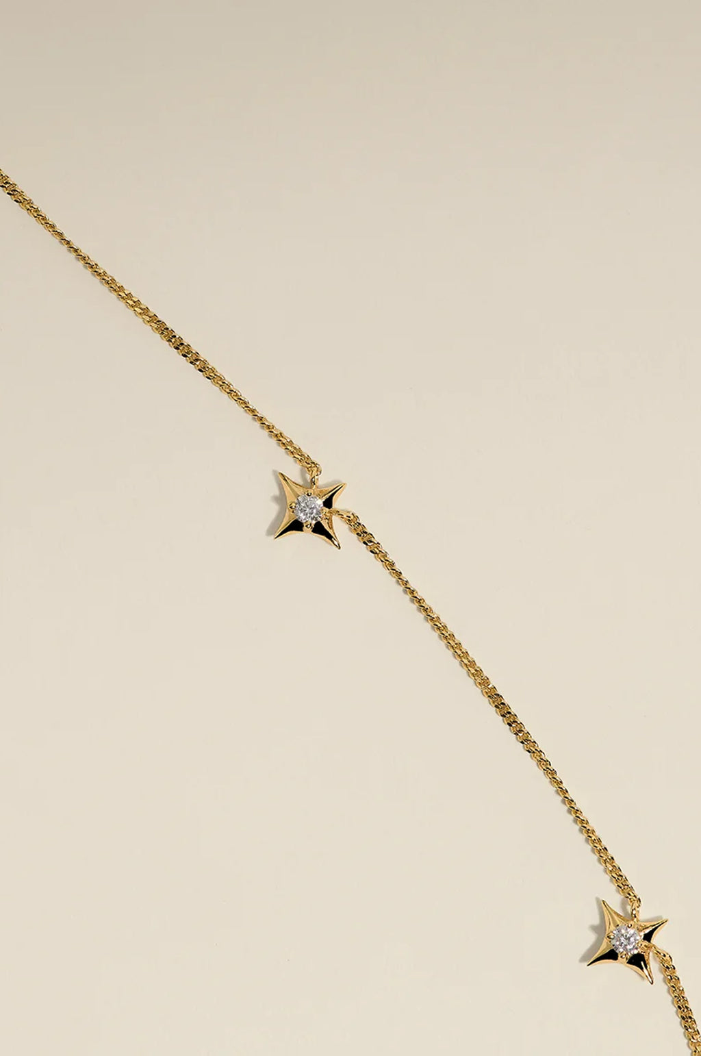 Cosmic Star Charm Necklace in Gold