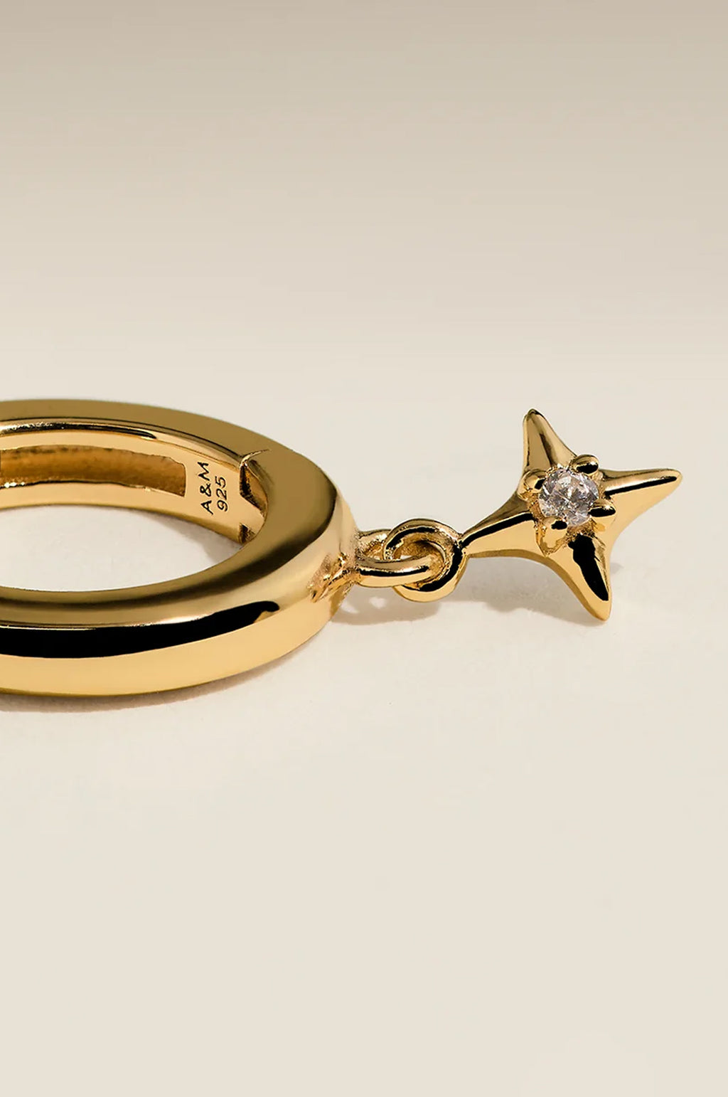 Cosmic Star Charm Huggies in Gold