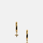 Astrid & Miyu Cosmic Star Charm Huggies in Gold.