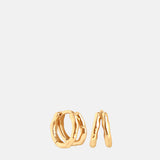 Astrid & Miyu Molten Textured Illusion Huggies in Gold.