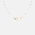 Astrid & Miyu Orbit Crystal Pendant Necklace in Gold.
