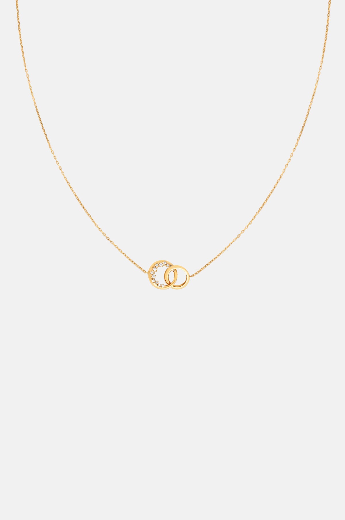 Astrid & Miyu Orbit Crystal Pendant Necklace in Gold.