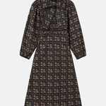 The Tiny Big Sister Dots Flowers Smock Dress.