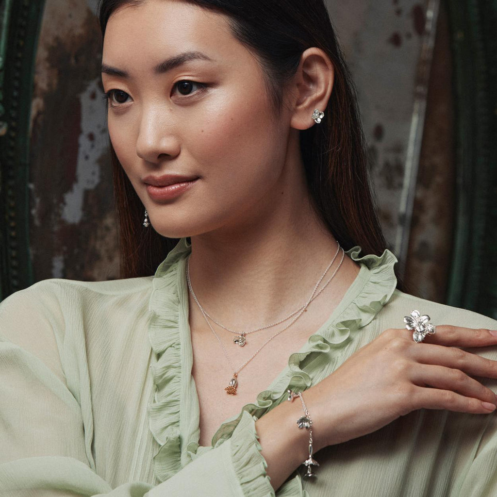 A.M. Cuckoo Flower Stud Earrings with White Pearl Silver