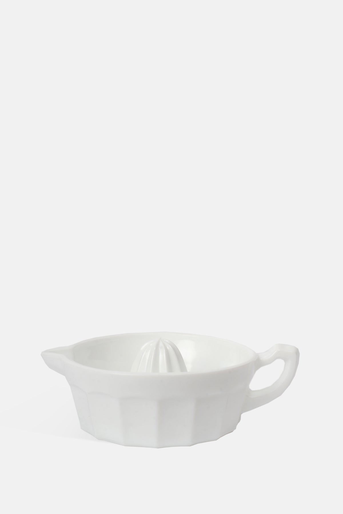 Mosser Glass milk white moulded glass juice reamer with pouring handle.