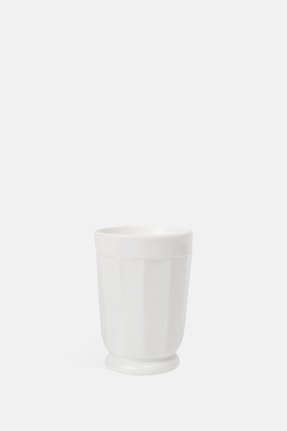 Mosser Glass milk white footed panelled tumbler holds 180ml.