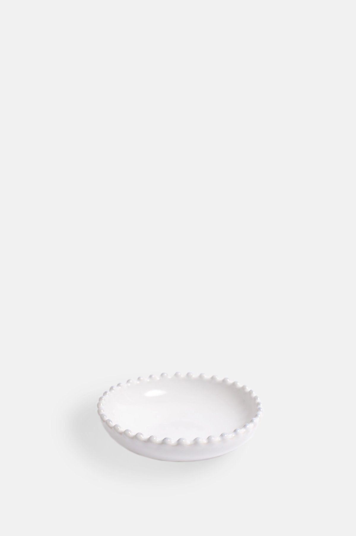 Costa Nova pearl white shallow mini bowl with pearl edging.