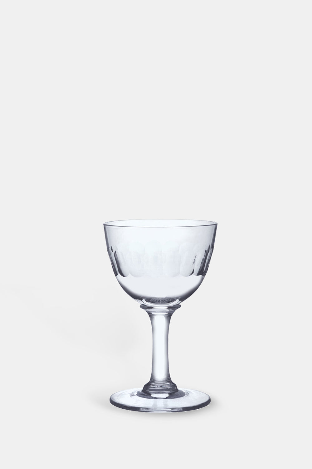 The Vintage List lens liqueur glass set with band of connecting ovals.